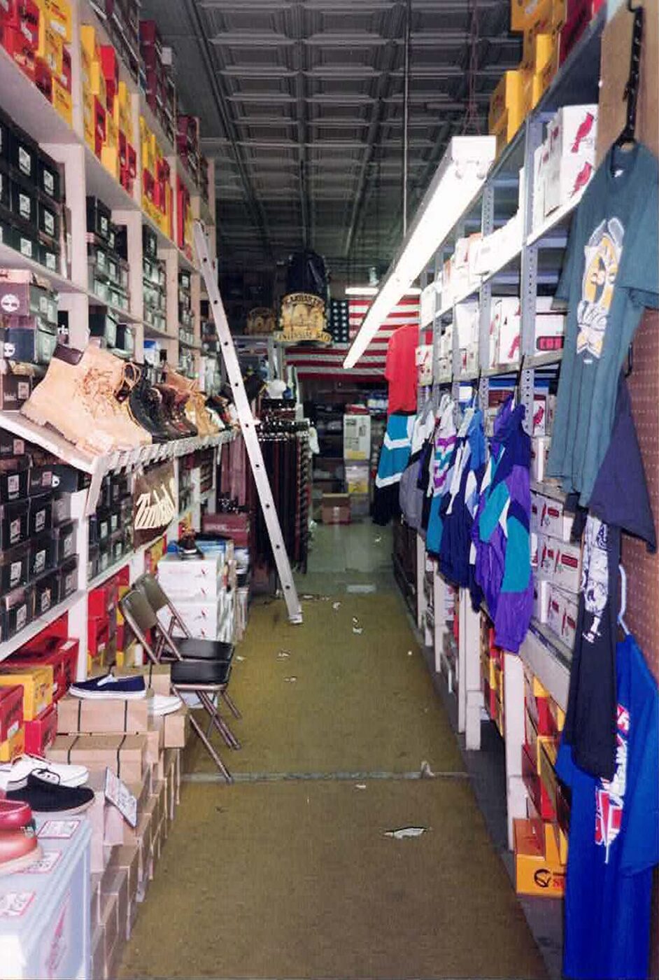 Interior of the original Atlantic Uniform store in Belleville, with shelves of workwear and footwear